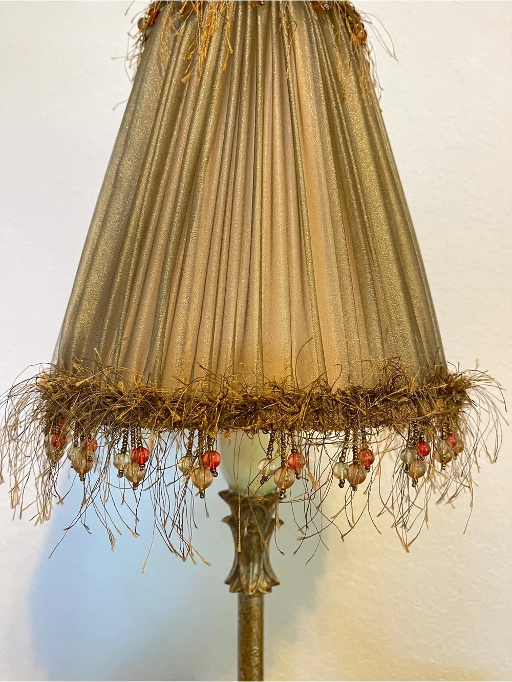 Vintage Victorian-style fringed beaded lampshade with a pleated, shimmery fabric
